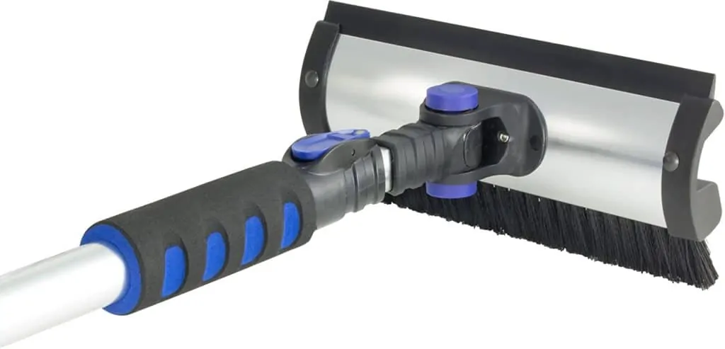 A product image featuring the front end of a multi-purpose tool to be stored inside a car and used for scraping ice off the wind shield and/or brushing snow off the car.